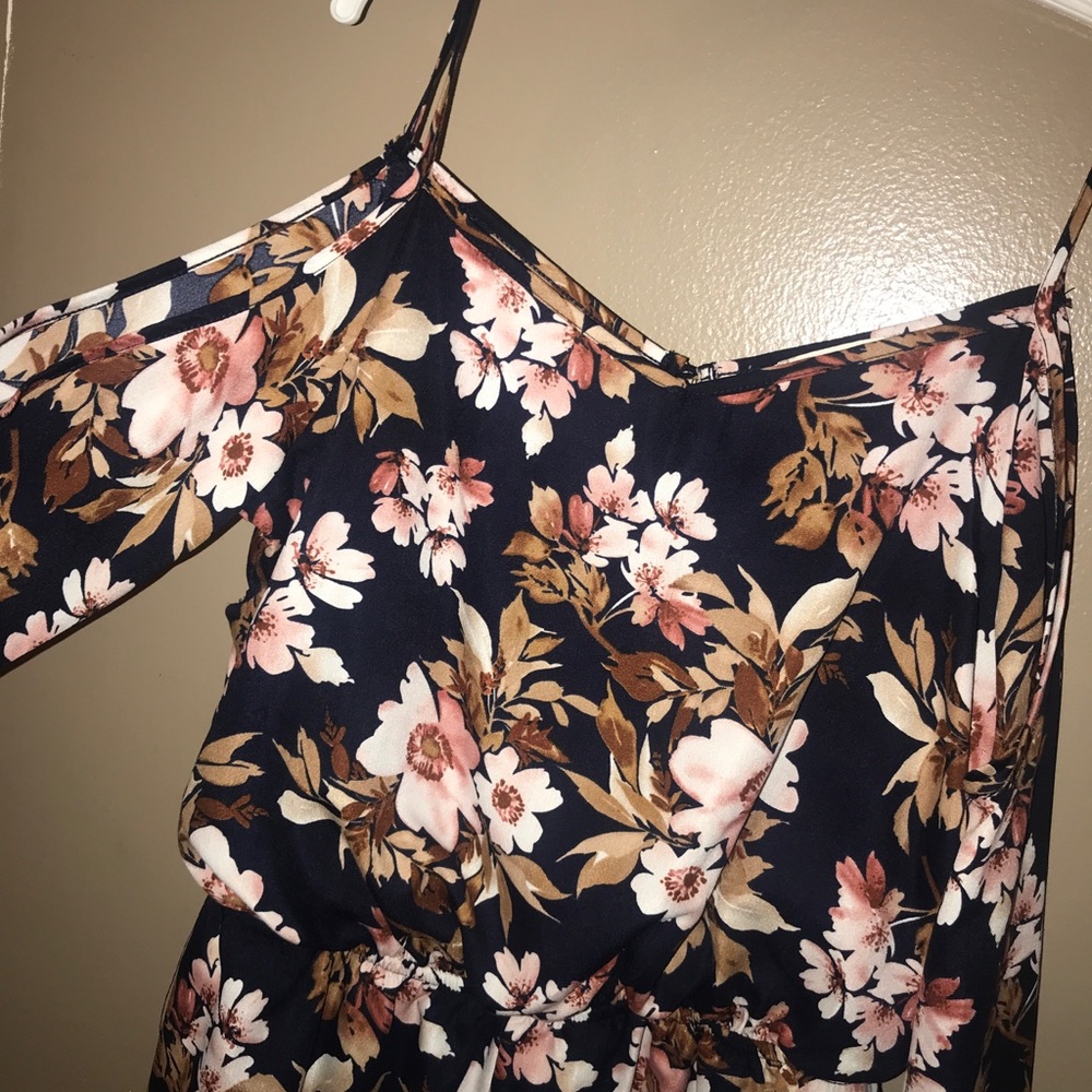 Floral Romper Cut out shoulder Never Worn